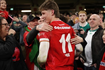 220225 - Wales v Ireland - Guinness 6 Nations Championship - Ellis Mee of Wales with family after the game