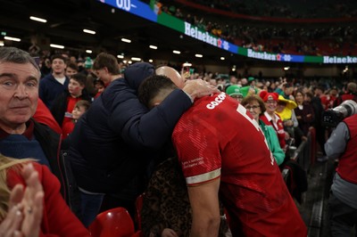 220225 - Wales v Ireland - Guinness 6 Nations Championship - Dafydd Jenkins of Wales with family after the game