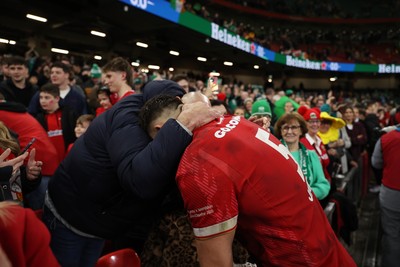 220225 - Wales v Ireland - Guinness 6 Nations Championship - Dafydd Jenkins of Wales with family after the game