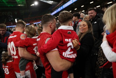 220225 - Wales v Ireland - Guinness 6 Nations Championship - Elliot Dee of Wales with family after the game