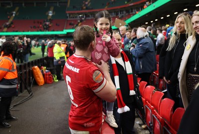 220225 - Wales v Ireland - Guinness 6 Nations Championship - Jac Morgan of Wales with family after the game