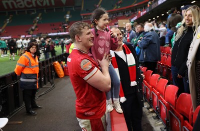 220225 - Wales v Ireland - Guinness 6 Nations Championship - Jac Morgan of Wales with family after the game