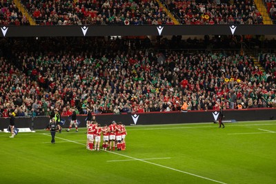 220225 - Cardiff Dragons Squad Portraits - Wales team huddle