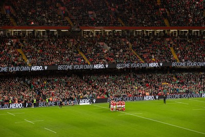 220225 - Cardiff Dragons Squad Portraits - Wales team huddle