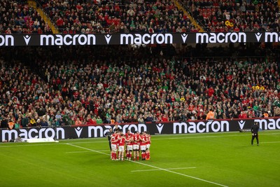 220225 - Cardiff Dragons Squad Portraits - Wales team huddle