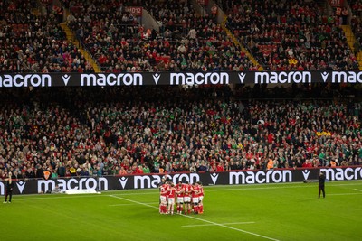 220225 - Cardiff Dragons Squad Portraits - Wales team huddle