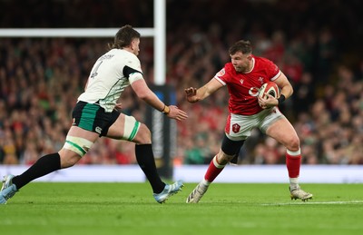 220225  Wales v Ireland, 2025 Guinness Six Nations - Elliot Dee of Wales takes on Joe McCarthy of Ireland