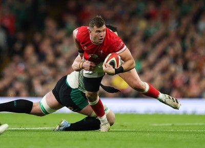 220225  Wales v Ireland, 2025 Guinness Six Nations - Elliot Dee of Wales takes on Joe McCarthy of Ireland