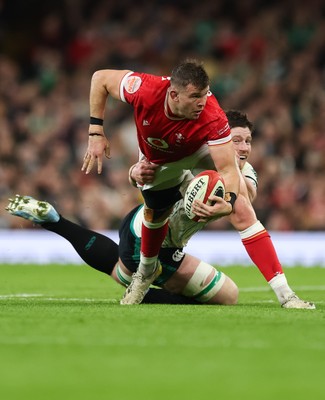 220225  Wales v Ireland, 2025 Guinness Six Nations - Elliot Dee of Wales takes on Joe McCarthy of Ireland