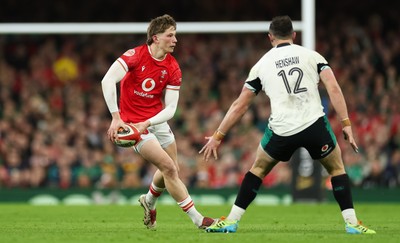 220225  Wales v Ireland, 2025 Guinness Six Nations - Ellis Mee of Wales takes on Robbie Henshaw of Ireland