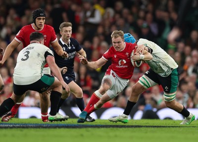 220225  Wales v Ireland, 2025 Guinness Six Nations - Blair Murray of Wales takes on Thomas Clarkson of Ireland