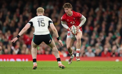 220225  Wales v Ireland, 2025 Guinness Six Nations - Ellis Mee of Wales takes on Jamie Osborne of Ireland