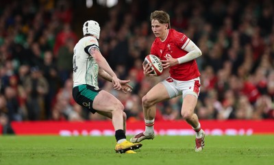 220225  Wales v Ireland, 2025 Guinness Six Nations - Ellis Mee of Wales takes on Mack Hansen of Ireland