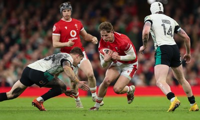 220225  Wales v Ireland, 2025 Guinness Six Nations - Ellis Mee of Wales takes on Garry Ringrose of Ireland and Mack Hansen of Ireland