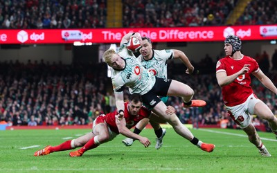 220225  Wales v Ireland, 2025 Guinness Six Nations - Jamie Osborne of Ireland is tackled by Tomos Williams of Wales