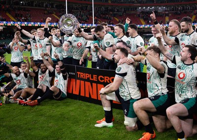 220225  Wales v Ireland, 2025 Guinness Six Nations - Ireland celebrate after being presented with the Triple Crown