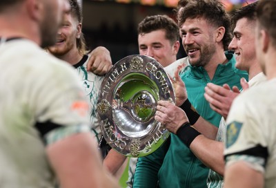 220225  Wales v Ireland, 2025 Guinness Six Nations - Ireland celebrate with the Triple Crown