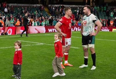 220225  Wales v Ireland, 2025 Guinness Six Nations - Gareth Anscombe of Wales chats with Jack Conan of Ireland at the end of the match