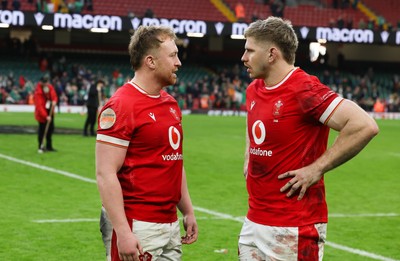 220225  Wales v Ireland, 2025 Guinness Six Nations - Tommy Reffell of Wales with Aaron Wainwright of Wales at the end of the match