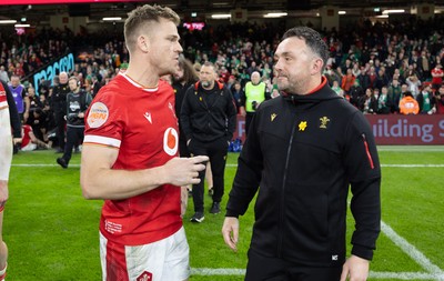 220225  Wales v Ireland, 2025 Guinness Six Nations - Wales interim head coach Matt Sherratt with Gareth Anscombe of Wales at the end of the match