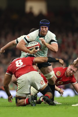 220225  Wales v Ireland, 2025 Guinness Six Nations - Cian Prendergast of Ireland takes on Taulupe Faletau of Wales