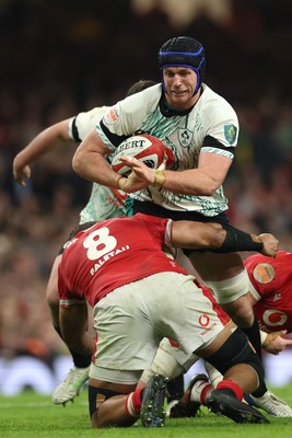 220225  Wales v Ireland, 2025 Guinness Six Nations - Cian Prendergast of Ireland takes on Taulupe Faletau of Wales