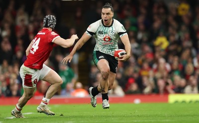 220225  Wales v Ireland, 2025 Guinness Six Nations - James Lowe of Ireland takes on Tom Rogers of Wales