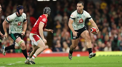 220225  Wales v Ireland, 2025 Guinness Six Nations - James Lowe of Ireland takes on Tom Rogers of Wales