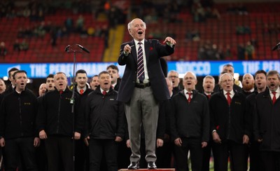 220225  Wales v Ireland, 2025 Guinness Six Nations - Musical Director Dr Hayden James conducts the crowd and choir