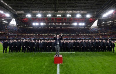 220225  Wales v Ireland, 2025 Guinness Six Nations - Musical Director Dr Hayden James conducts the crowd and choir