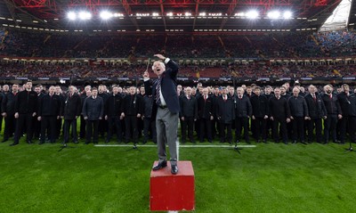 220225  Wales v Ireland, 2025 Guinness Six Nations - Musical Director Dr Hayden James conducts the crowd and choir