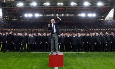 220225  Wales v Ireland, 2025 Guinness Six Nations - Musical Director Dr Hayden James conducts the crowd and choir