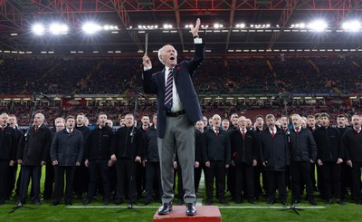 220225  Wales v Ireland, 2025 Guinness Six Nations - Musical Director Dr Hayden James conducts the crowd and choir