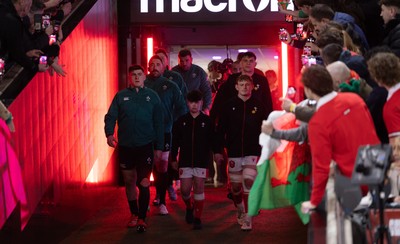 220225  Wales v Ireland, 2025 Guinness Six Nations - Dan Sheehan of Ireland and Jac Morgan of Wales with match mascot