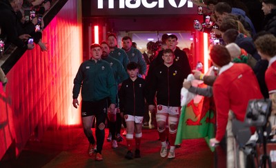 220225  Wales v Ireland, 2025 Guinness Six Nations - Dan Sheehan of Ireland and Jac Morgan of Wales with match mascot