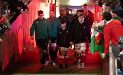 220225  Wales v Ireland, 2025 Guinness Six Nations - Dan Sheehan of Ireland and Jac Morgan of Wales with match mascot