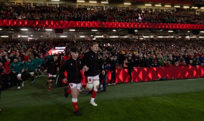 220225  Wales v Ireland, 2025 Guinness Six Nations - Jac Morgan of Wales runs out with match mascot George Rogers