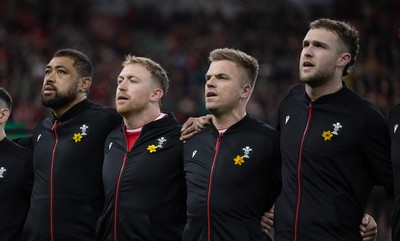 220225  Wales v Ireland, 2025 Guinness Six Nations - Taulupe Faletau of Wales, Tommy Reffell of Wales, Gareth Anscombe of Wales and Max Llewellyn of Wales during the anthem