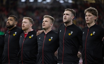 220225  Wales v Ireland, 2025 Guinness Six Nations - Taulupe Faletau of Wales, Tommy Reffell of Wales, Gareth Anscombe of Wales Max Llewellyn of Wales and Ellis Mee of Wales during the anthem