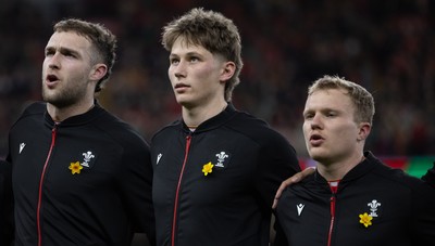 220225  Wales v Ireland, 2025 Guinness Six Nations - Max Llewellyn of Wales, Ellis Mee of Wales and Blair Murray of Wales during the anthem