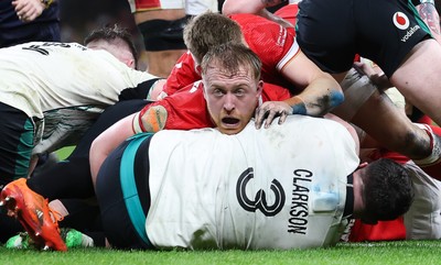 220225  Wales v Ireland, 2025 Guinness Six Nations - Tommy Reffell of Wales with Thomas Clarkson of Ireland