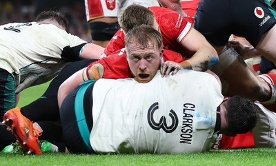 220225  Wales v Ireland, 2025 Guinness Six Nations - Tommy Reffell of Wales with Thomas Clarkson of Ireland