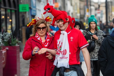 220225 - Wales v Ireland - Guinness Six Nations - Wales and Ireland fans mix in the street prior to the game