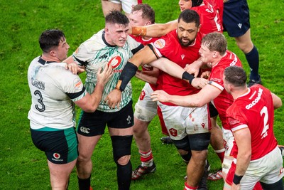 220225 - Wales v Ireland - Guinness Six Nations - Tempers flare between Dan Sheehan of Ireland and Elliot Dee of Wales