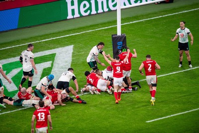 220225 - Wales v Ireland - Guinness Six Nations - Wales celebrate after Jac Morgan (obscured) scores their first try