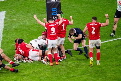 220225 - Wales v Ireland - Guinness Six Nations - Wales celebrate after Jac Morgan (obscured) scores their first try