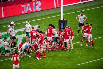 220225 - Wales v Ireland - Guinness Six Nations - Wales celebrate after Jac Morgan (obscured) scores their first try