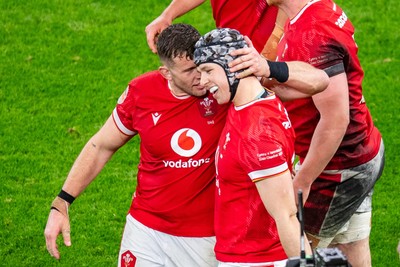 220225 - Wales v Ireland - Guinness Six Nations -  Tom Rogers of Wales celebrates scoring a try 