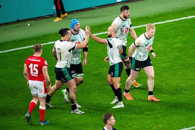 220225 - Wales v Ireland - Guinness Six Nations -  Ireland celebrate their second try by Jamie Osborne of Ireland