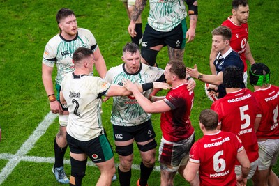 220225 - Wales v Ireland - Guinness Six Nations - Tempers flare between Dan Sheehan of Ireland and Tommy Reffell of Wales